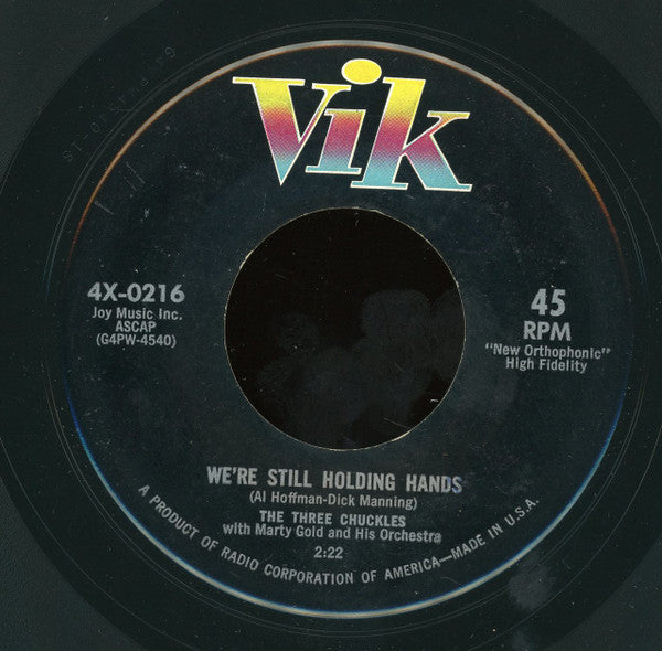 The Three Chuckles With Marty Gold And His Orchestra : We're Still Holding Hands / Gypsy In My Soul (7")