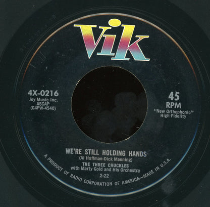 The Three Chuckles With Marty Gold And His Orchestra : We're Still Holding Hands / Gypsy In My Soul (7")