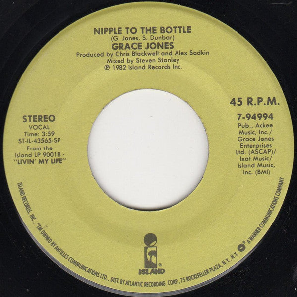 Grace Jones : Nipple To The Bottle / I Need A Man (7", Single)