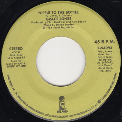 Grace Jones : Nipple To The Bottle / I Need A Man (7", Single)