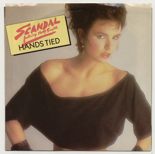 Scandal (4) Featuring Patty Smyth : Hands Tied (7", Single, Styrene)