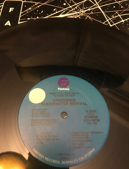 Creedence Clearwater Revival : Medley: From "Proud Mary" To "Up Around The Bend (12")