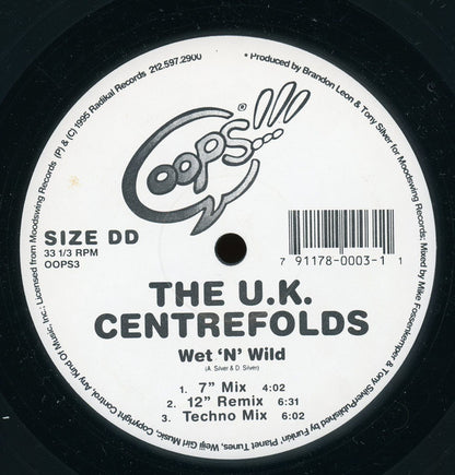 Grab This / The U.K. Centrefolds : Get Your Tits Out For Xmas / Wet 'N' Wild (12")