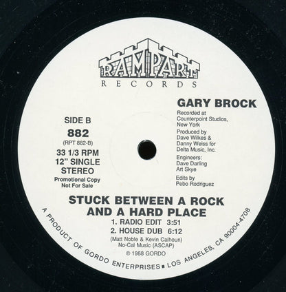 Gary Brock : Stuck Between A Rock And A Hard Place (12", Single, Promo)