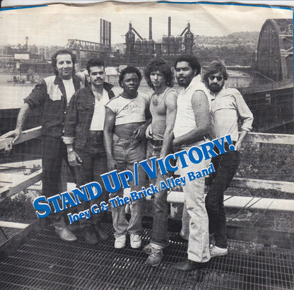 Joey G* & The Brick Alley Band : Stand Up / Victory! (7")